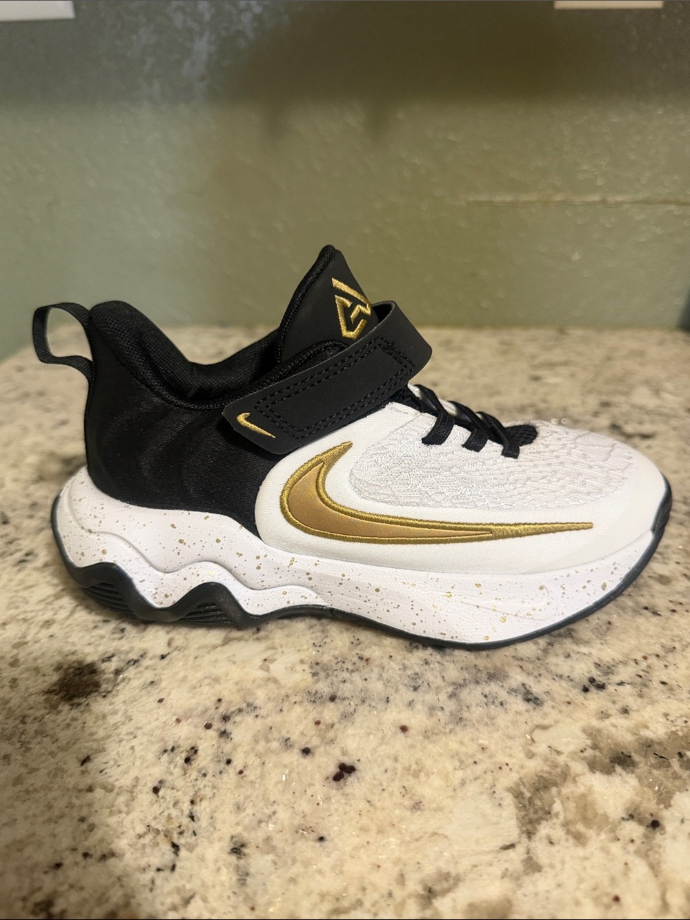 Nike Kids Gianni’s Black White Gold Sneakers